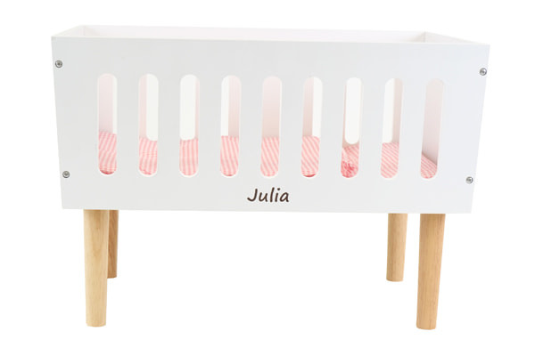 Personaliseer het poppenbedje