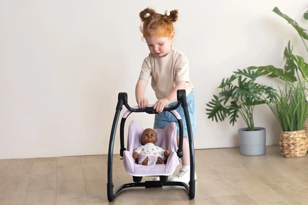 Schommel de pop heen en weer